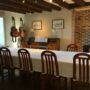 La Bihourderie dining room wooden beams table chairs